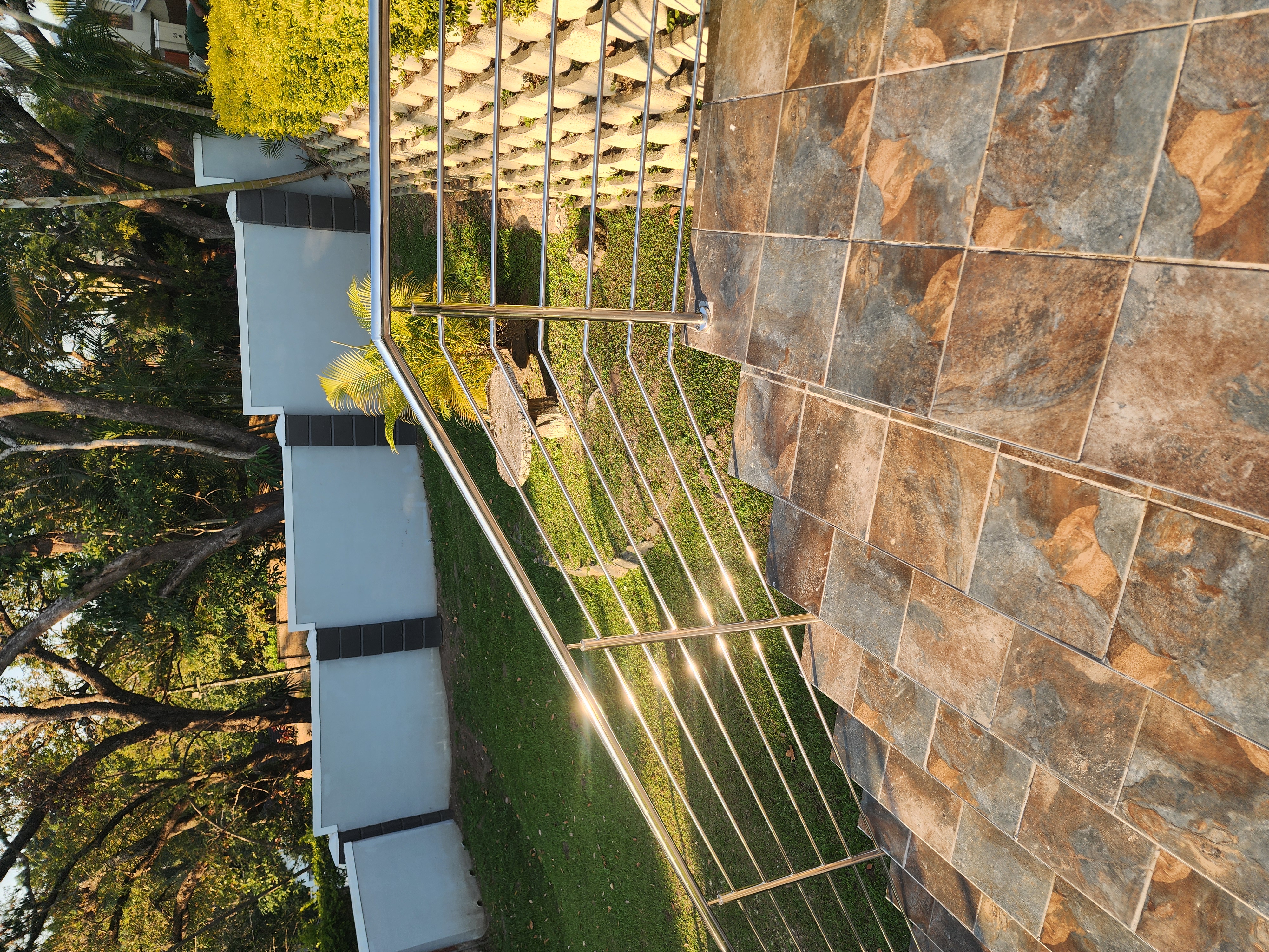 Suspended deck with a pergola